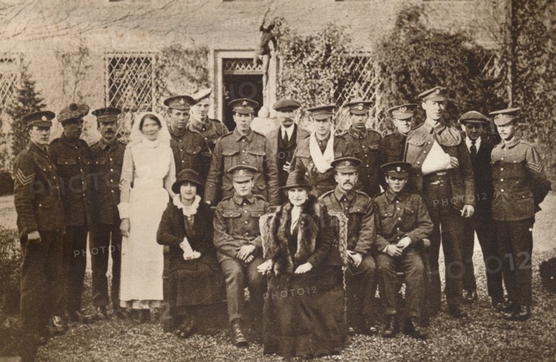 'Lady Elizabeth with Countess of Strathmore and convalescent wounded soldiers', 1916 Creator: Unknown.