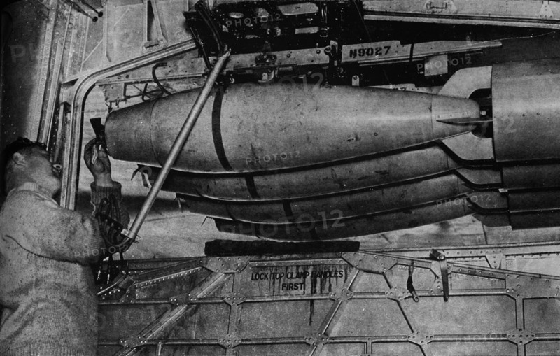 Heavy bombs in the racks of a RAF Short Sunderland flying boat, c1940 (1943). Artist: Unknown.