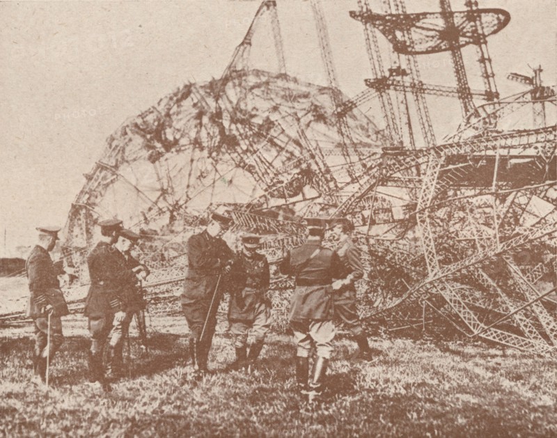 British staff officers examining the wreckage of a Zeppelin brought down in England, c1917 (1919). Artist: Unknown.