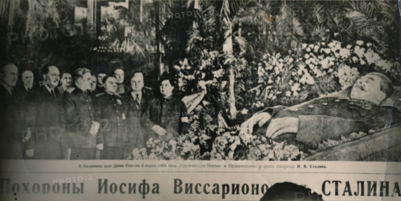 'Soviet leaders visit the flower-decked bier of Stalin in Moscow's Hall of Columns. Behind the chief Artist: Unknown.
