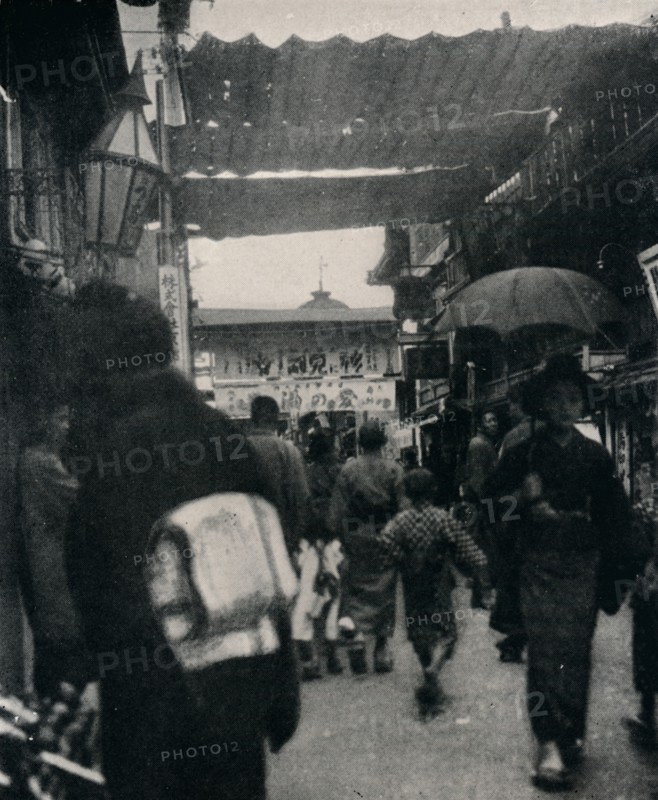 'The theatre street in Kyoto is one of the most interesting highways in the world', c1900, (1921). Artist: Julian Leonard Street.