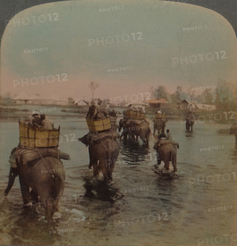 'Returning to camp after a day's shoot, Bebar jungle, India', 1909. Artists: Elmer Underwood, Bert Elias Underwood.