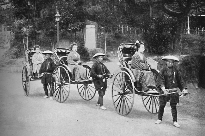 Japanese ladies in rickshaws drawn by coolies, 1902. Artist: Unknown.