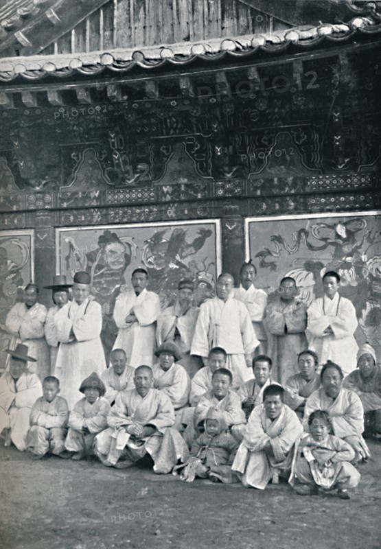 Priests and monks in a Korean monastery, or lamasery, 1902. Artist: Walter Hillier.