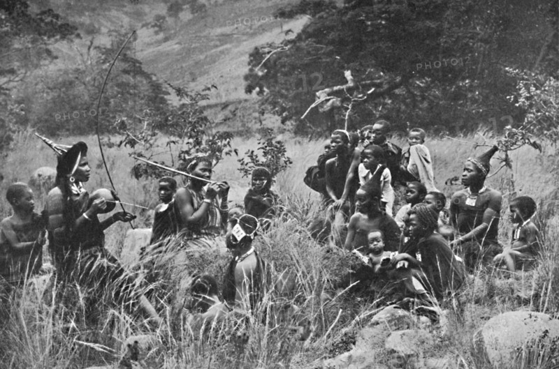A Zulu musician and audience, 1912. Artist: Unknown.