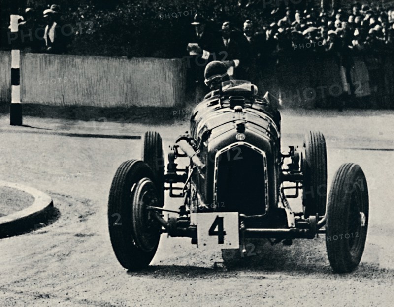 'Smart cornering in I.O.M. Race: The Hon. Brian Lewis', 1937. Artist: Unknown.