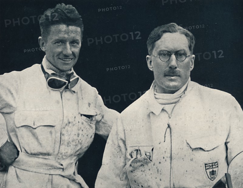 'Captain G. E. T. Eyston and assistant', 1937. Artist: Unknown.