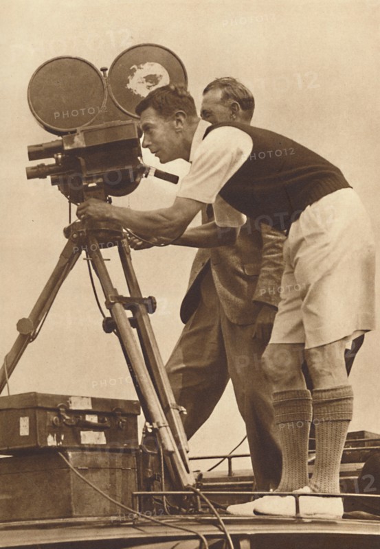 'Film-maker - Making a cinema record at one of his annual camps for boys', 1927 (1937). Artist: Unknown.