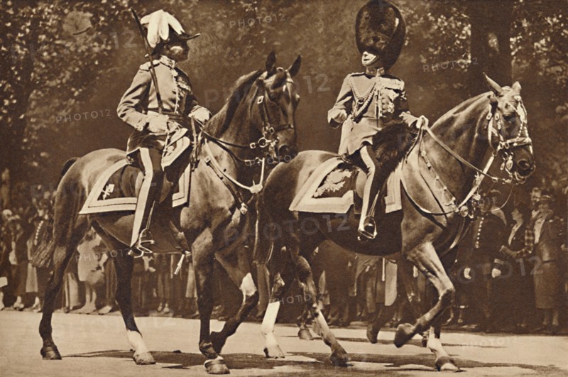 'King Edward at the head of the Brigade of Guards, turns, unperturbed, to make inquiry after revolve Creator: Unknown.