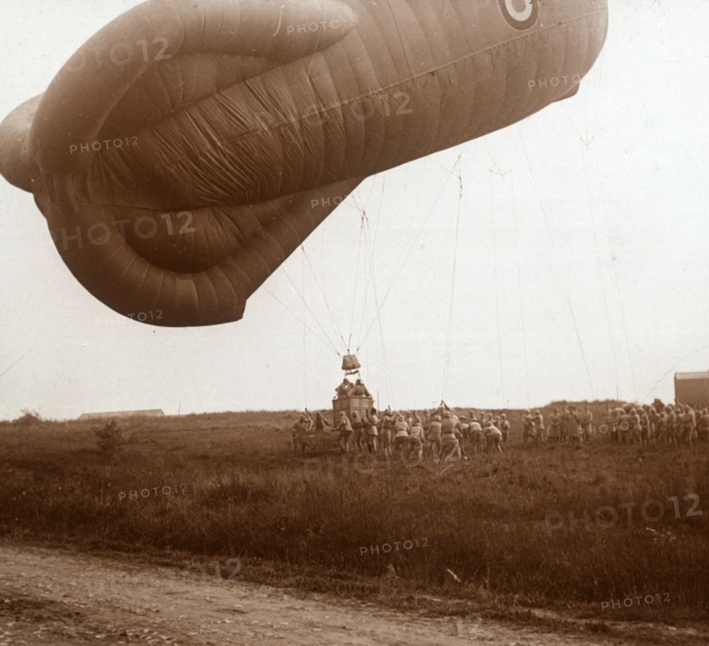 Raising of barrage balloon with basket for observation, c1914-c1918. Artist: Unknown.
