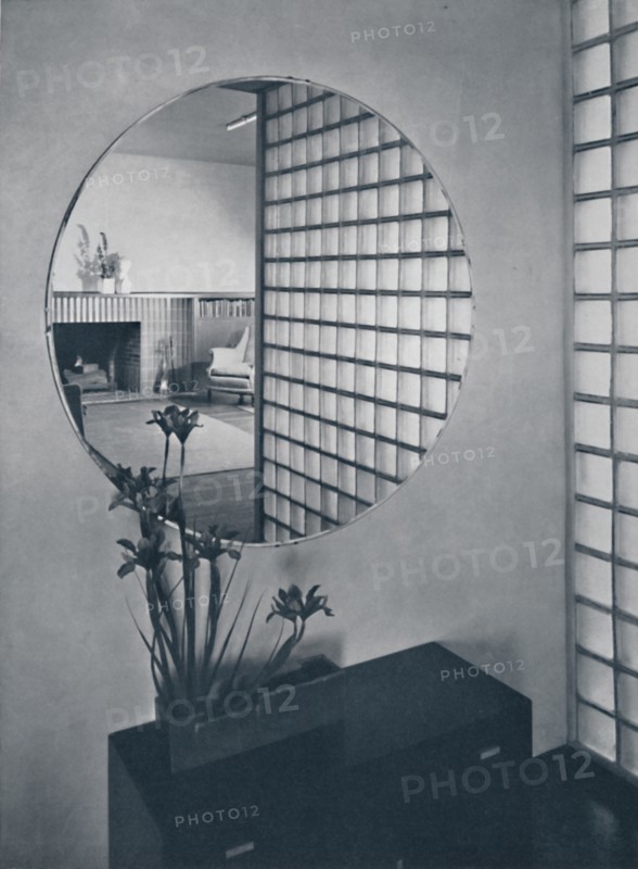 'Entrance hall in the house of Dr. and Mrs. James B. Graeser in Oakland, California, showning the gl Artist: Michael Goodman.