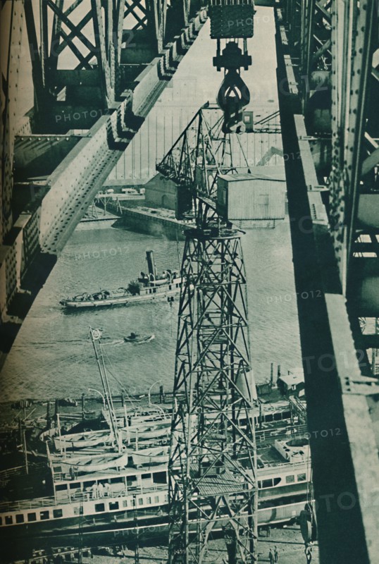 'Seen from a crane, the River Clyde has appearance of a long narrow dock basin', 1937. Artist: Unknown.