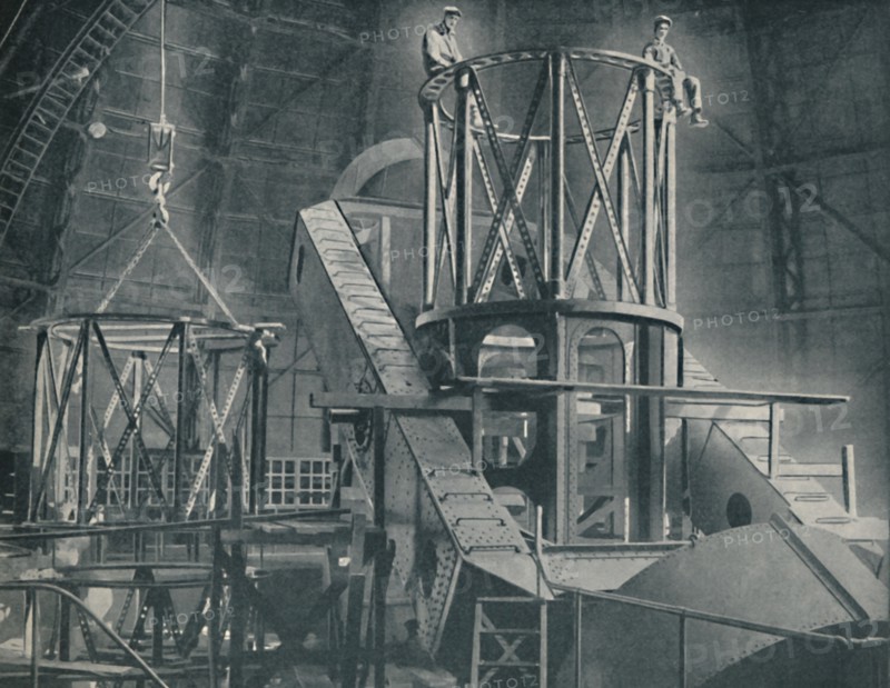 'Section By Section Mounts The Huge Steel Framework of the Hooker's Cylinder', c1935. Artist: Unknown.