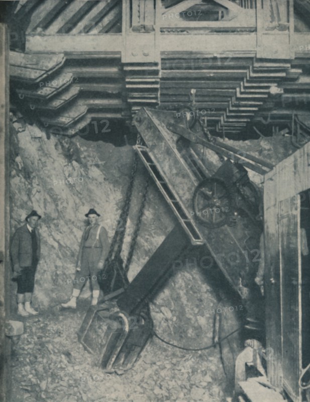 'Clawing Out the Heart of a Mountain for a Colorado City Tunnel', c1935. Artist: Unknown.