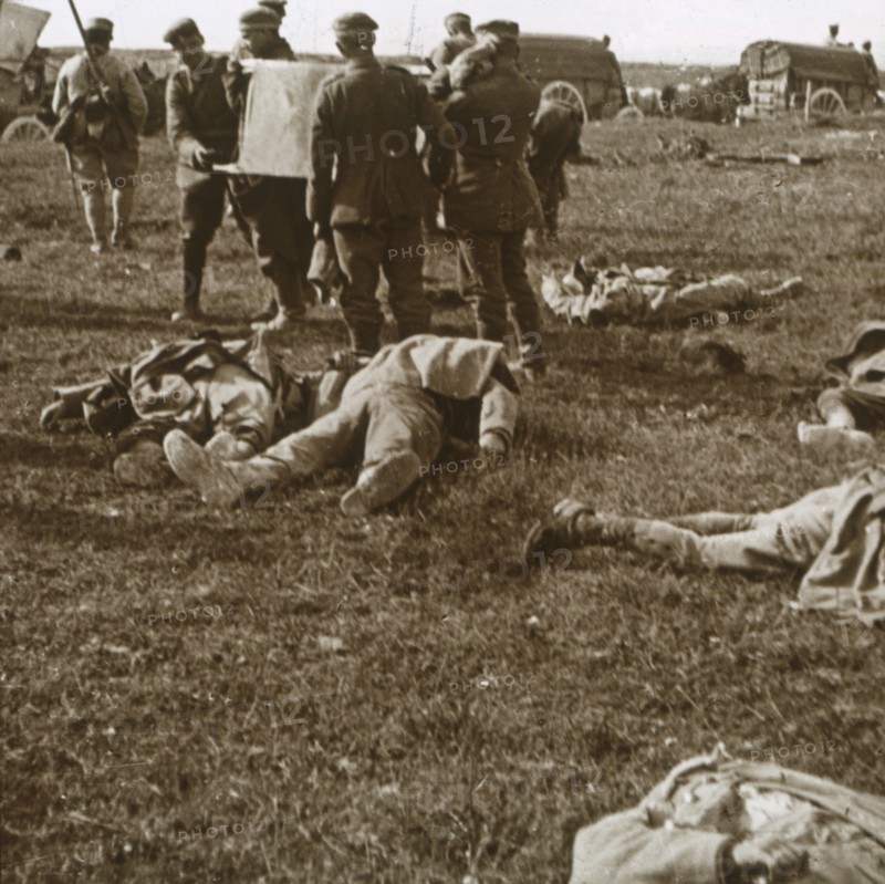 Burying bodies, Sainte-Marie-à-Py, northern France, c1914-c1918. Artist: Unknown.