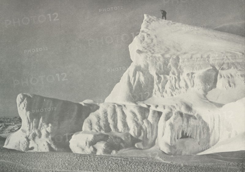 'On the Summit of an Iceberg', c1911, (1913). Artist: Herbert Ponting.