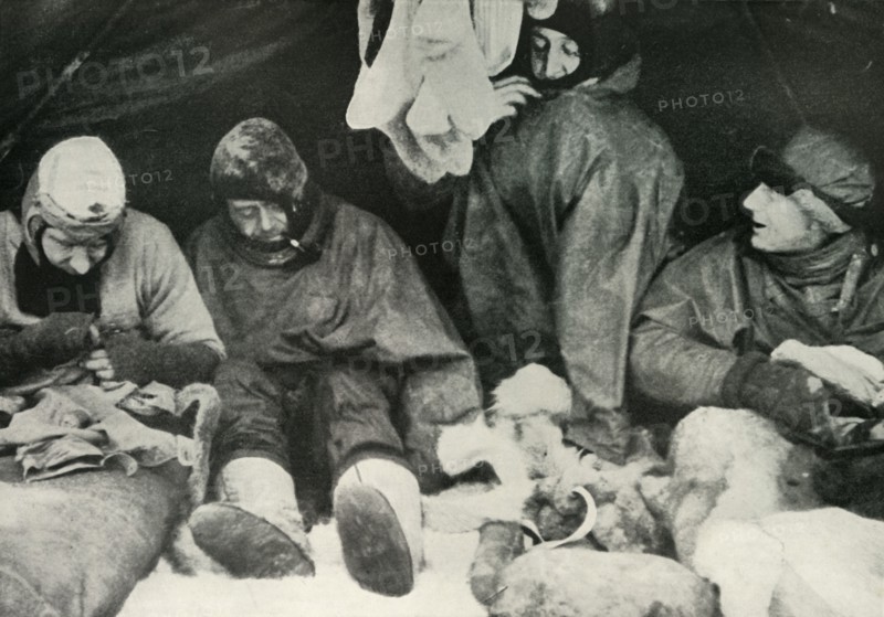 'Members of the Polar Party Getting Into Their Sleeping-Bags', c1911, (1913).  Artist: Herbert Ponting.