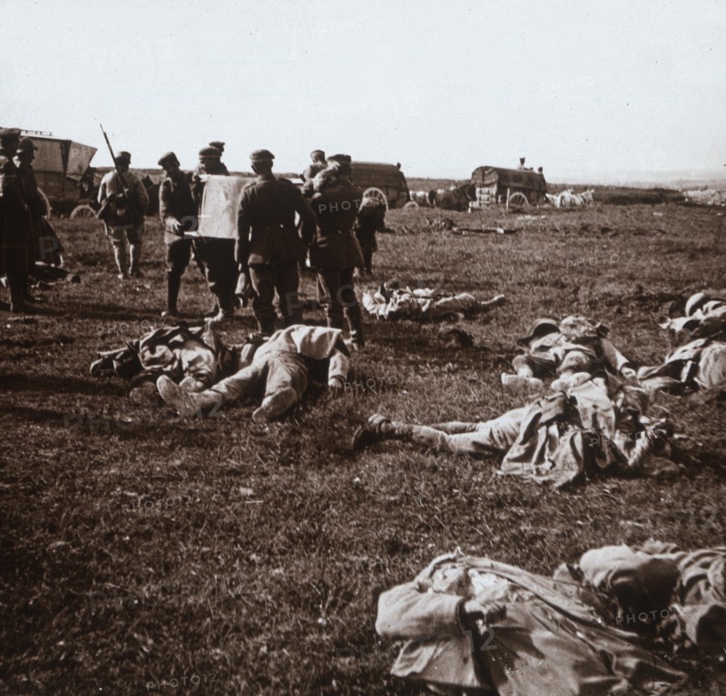 Burying bodies, Sainte-Marie-à-Py, northern France, c1914-c1918. Artist: Unknown.