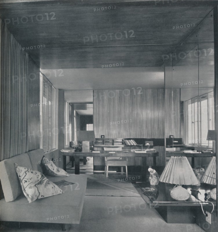 'Desk in bedroom-sitting room', 1942.  Artist: Unknown.