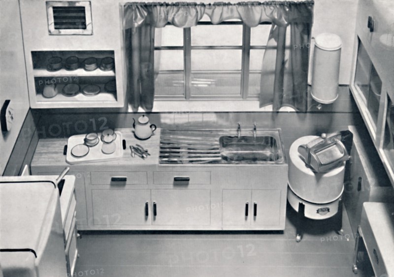 'View of a kitchen, designed by H.M.V. Household Appliances', 1938. Artist: Unknown.
