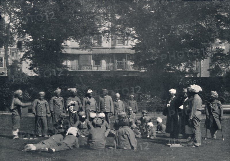 'Convalescent Indian Soldiers Playing Quoits on the Eastern Lawns', c1915, (1939). Artist: Unknown.