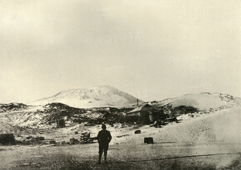 'The Hut, with Mount Erebus in the Background, in the Autumn', 1908, (1909).  Artist: Unknown.