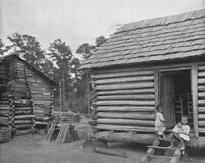 'Negro Log Huts', Thomasville, Georgia, USA, c1900. Creator: Unknown.