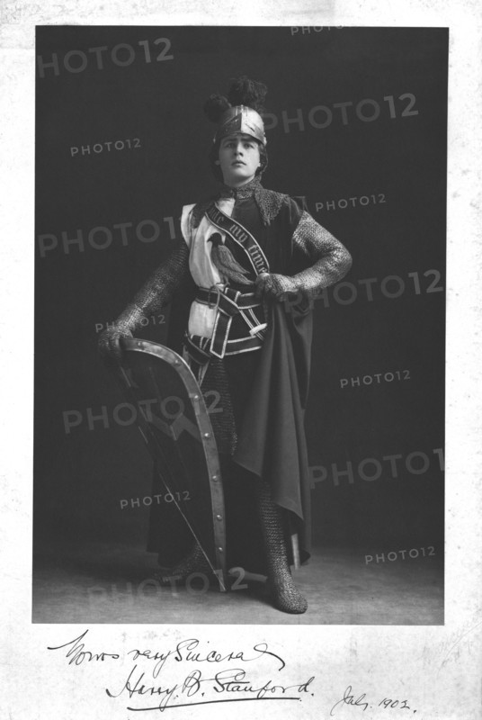 Man wearing a suit of armour, 1902. Creator: Unknown.