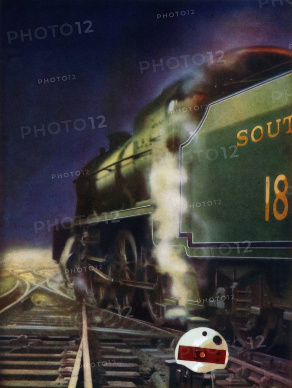 'The Night Journey. A mixed-traffic locomotive of the Southern Railway at a cross-over', 1935. Creator: Unknown.