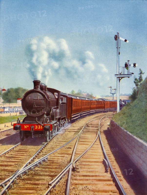 'Leaving Dublin. Great Southern Railways train, hauled by a 4-4-0 passenger express', 1935. Creator: Unknown.