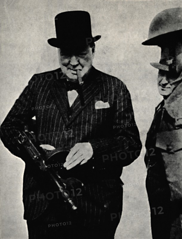 'Trying Out a Tommy-Gun', 1940, (1945). Creator: Unknown.