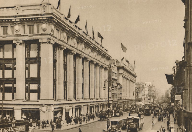 'Selfridge's and the last of the old Oxford Street shops that the building engulfed', c1935. Creator: Unknown.