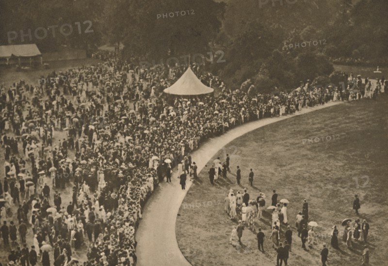 'A Glimpse of One of the Annual Royal Garden Parties Among The Timbered Lawns of Buckingham Palace', Creator: Unknown.
