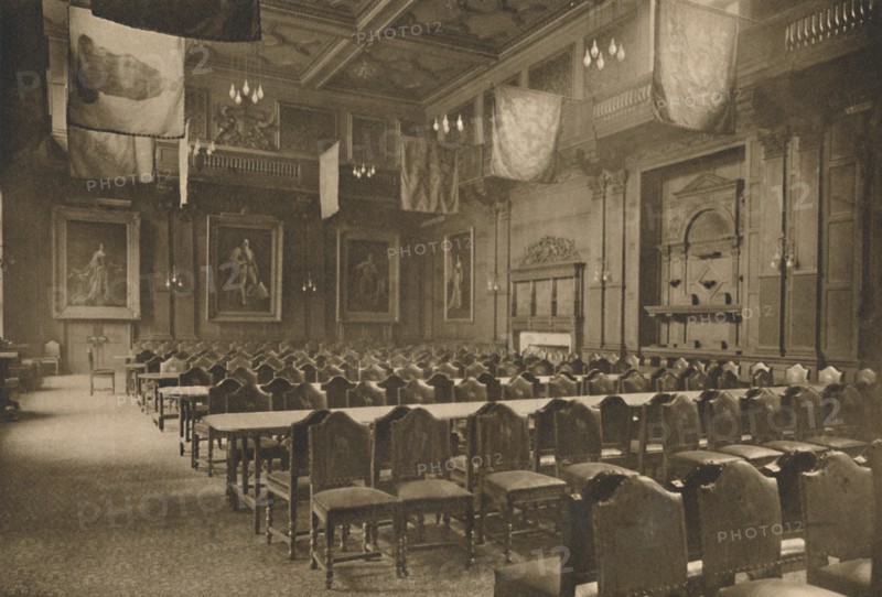 'Flag-Hung Great Hall in Which the Powerful Company of Grocers Holds Its Banquets', c1935. Creator: Unknown.