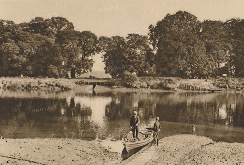 'London's River at Isleworth Ferry Looking Towards the Green Glades of Kew Gardens', c1935. Creator: Donald McLeish.