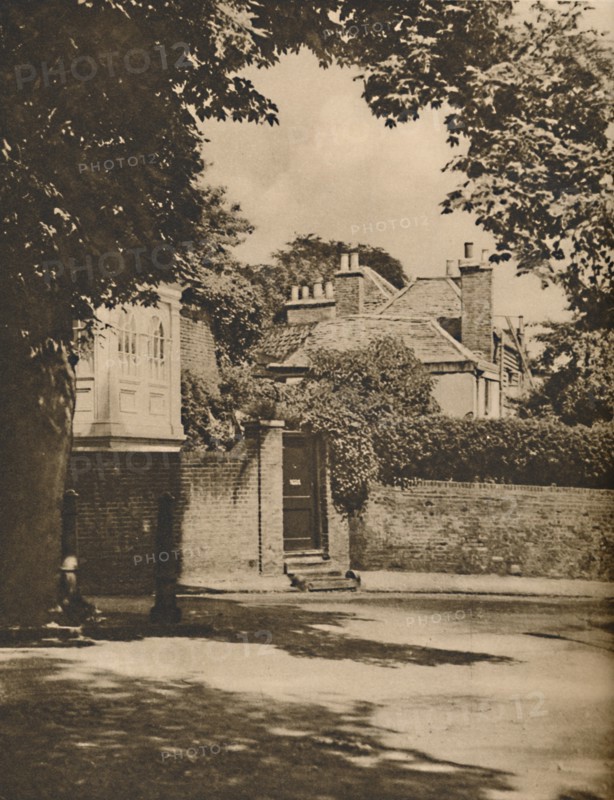 'Sunlight and Shadow in a Winding Highgate Road', c1935. Creator: Paterson.