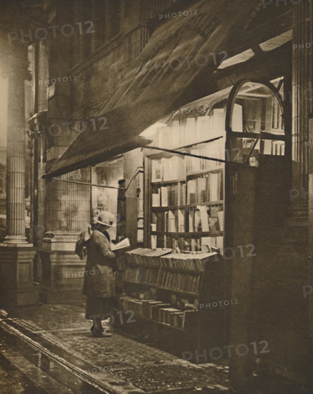 'Wet Winter Evening and a Book Lover in Bloomsbury', c1935. Creator: Fincham.