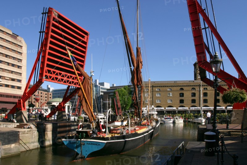 Barge passing through St Katherine's Lock, London