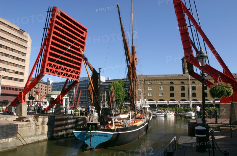 Barge passing through St Katherine's Lock, London