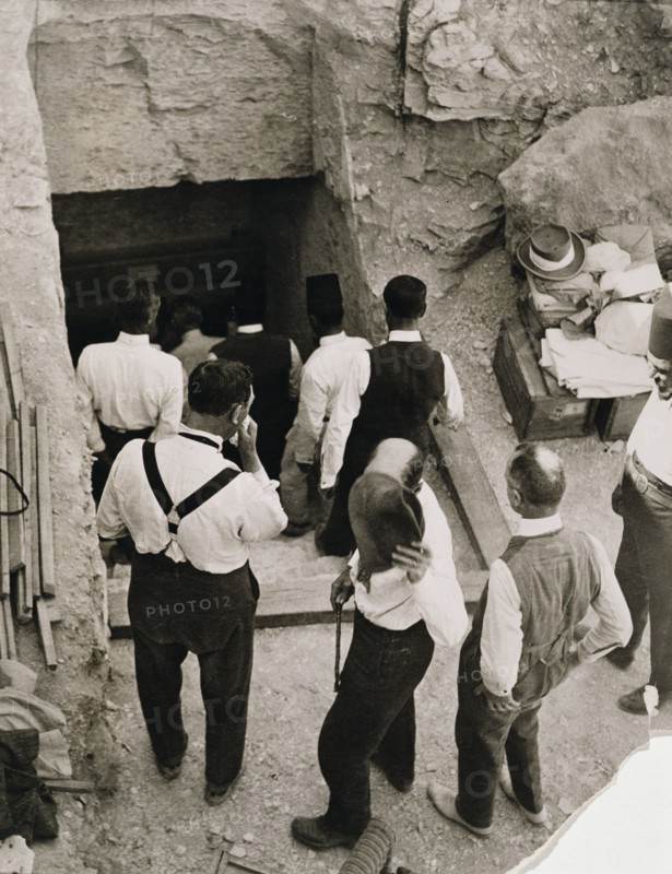 A party going down the steps to the tomb of Tutankhamun, Valley of the Kings, Egypt, 1923. Artist: Harry Burton