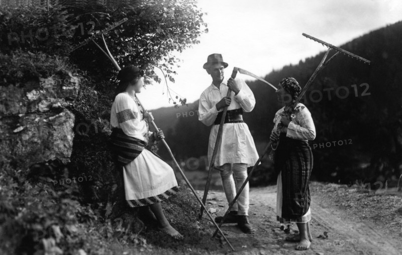 Farm workers with scythes and rakes, Bistrita Valley, Moldavia, north-east Romania, c1920-c1945. Artist: Adolph Chevalier