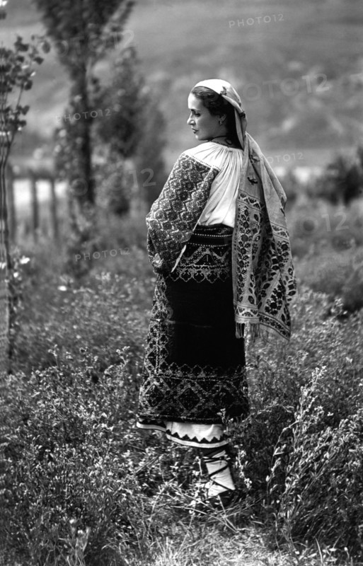 Young woman in traditional costume, Bistrita Valley, Moldavia, north-east Romania, c1920-c1945. Artist: Adolph Chevalier