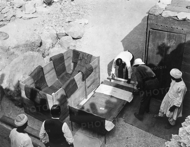 Archaeologists working  at the Tomb of Tutankhamun, Valley of the Kings, Egypt, 1922. Artist: Harry Burton