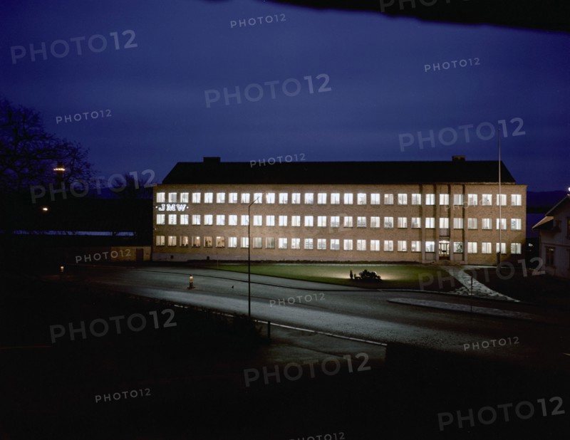 Exterior of an engineering industry building at night, Jönköping, Sweden, 1954. Artist: Göran Algård