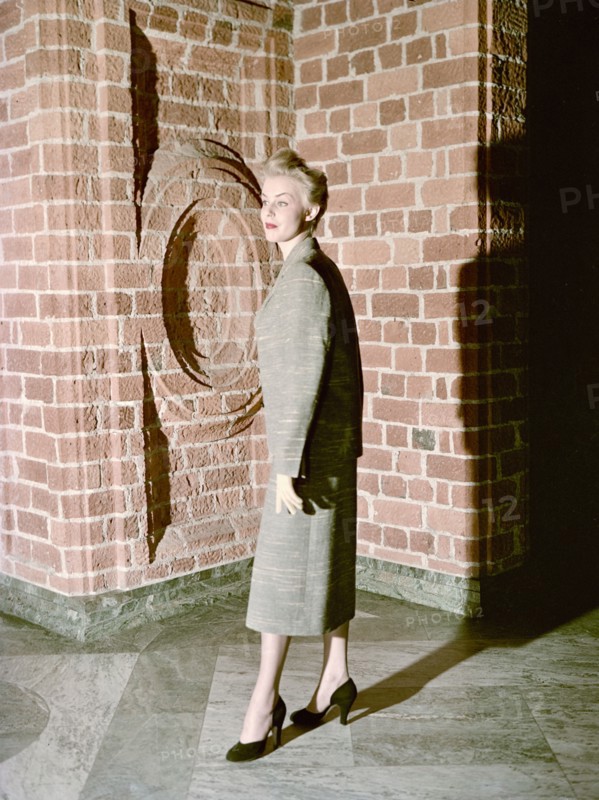 Female model shows a suit, the Historical Museum, Stockholm, 1950s. Artist: Göran Algård