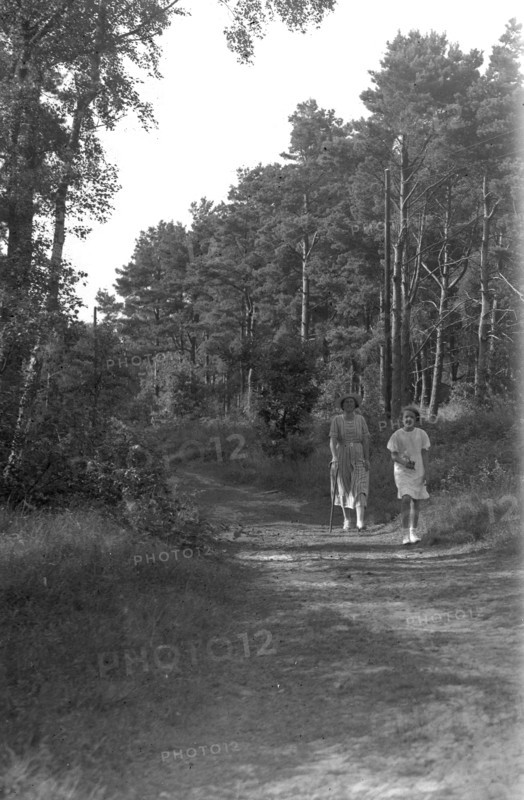 A mother and daughter walking in the forest, Skälderviken, Sweden, 1920s. Artist: Unknown