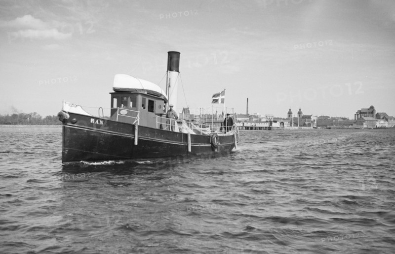 The tugboat 'Ran' leaving Landskrona, harbour, Sweden, 1935. Artist: Unknown