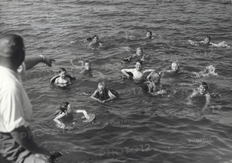 Boys having a swimming lesson, Sweden, 1939. Artist: Otto Ohm