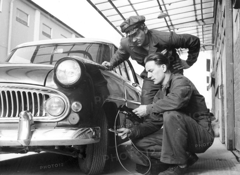 Service at a garage, Trelleborg, Sweden, 1950s. Artist: Unknown