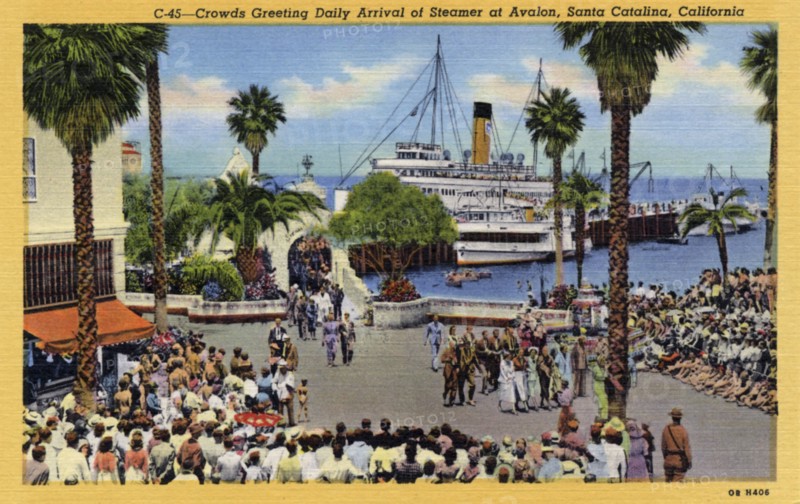 Crowds greet the daily arrival of a steamer, Avalon, Santa Catalina Island, California, USA, 1940. Artist: Unknown